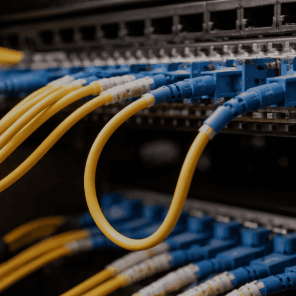 fiber optic cable installation with improper bend radius causing signal loss in business network
